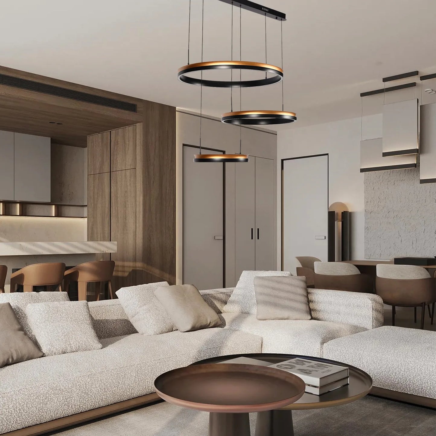 Stylish lighting fixtures hang above a modern living space. Statement pendant lighting adds a touch of luxury.