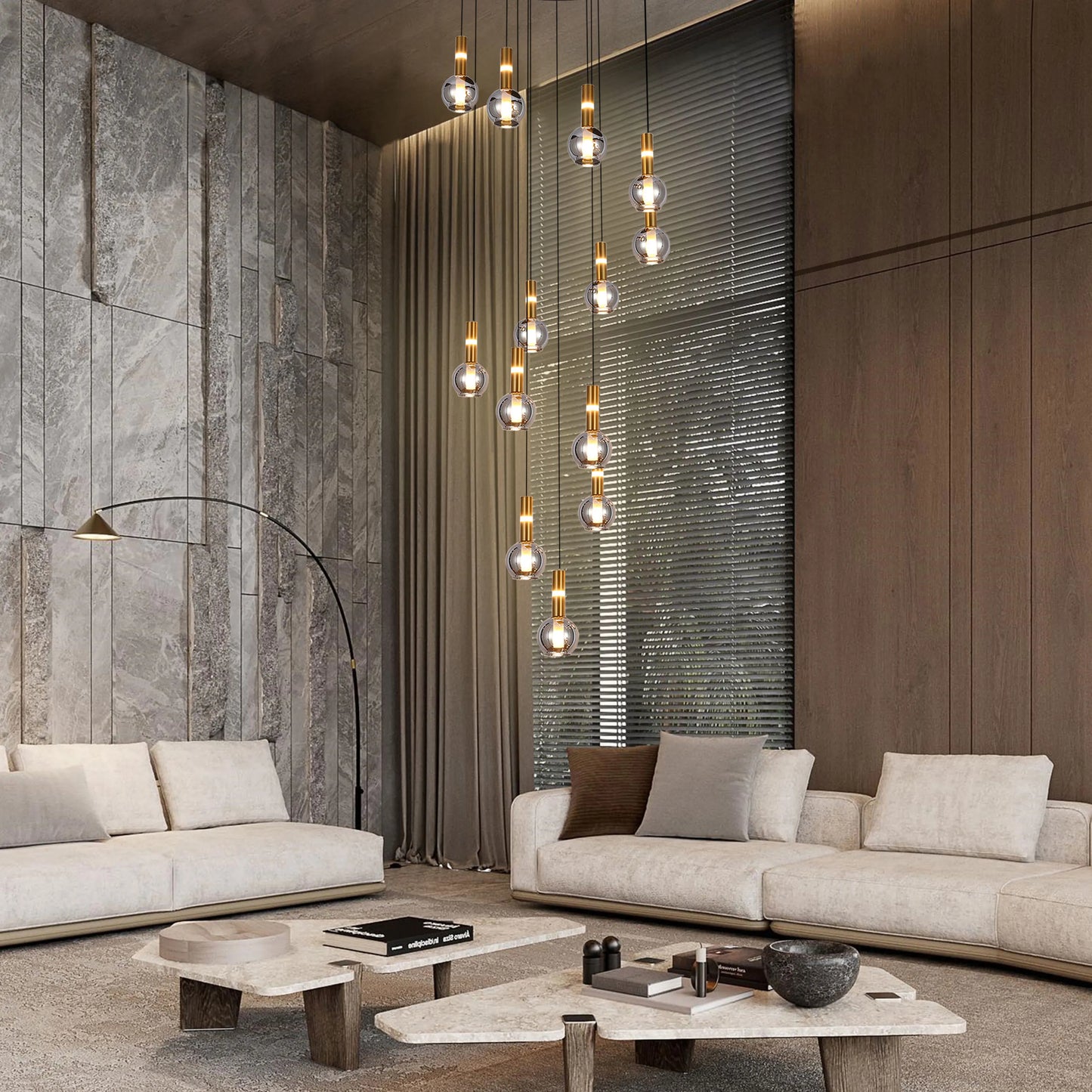 A modern lighting display with stylish globe pendant lights hanging above contemporary sofas and a unique coffee table.
