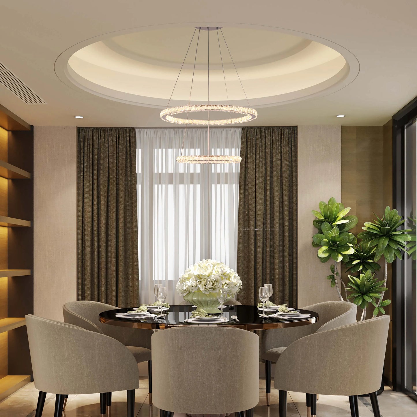 A contemporary dining room is illuminated by a statement circular chandelier with warm, ambient recessed ceiling lights.