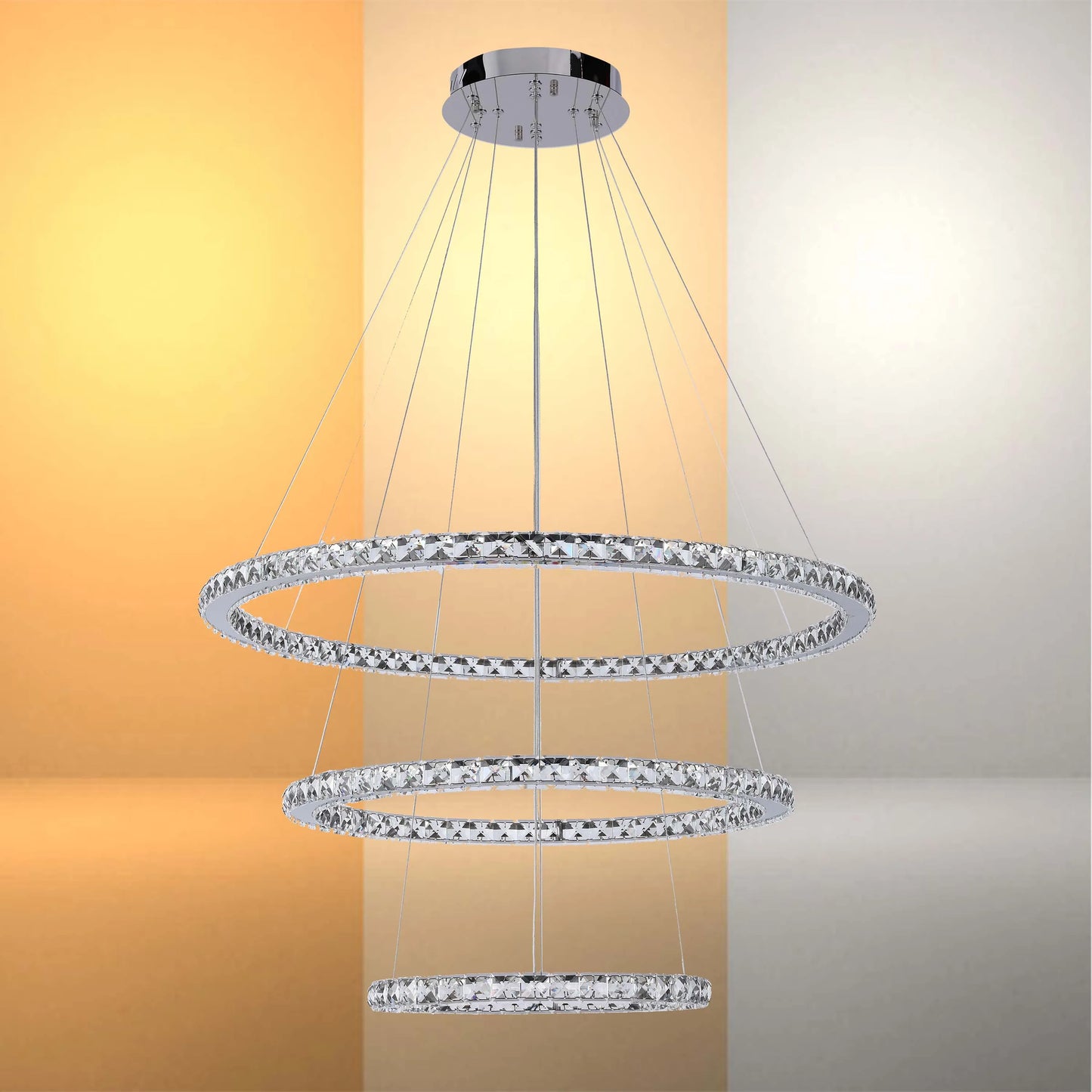 Chrome multi-tiered crystal halo pendant light. A contemporary eye-catching design that adds sparkle and luxury to any room.