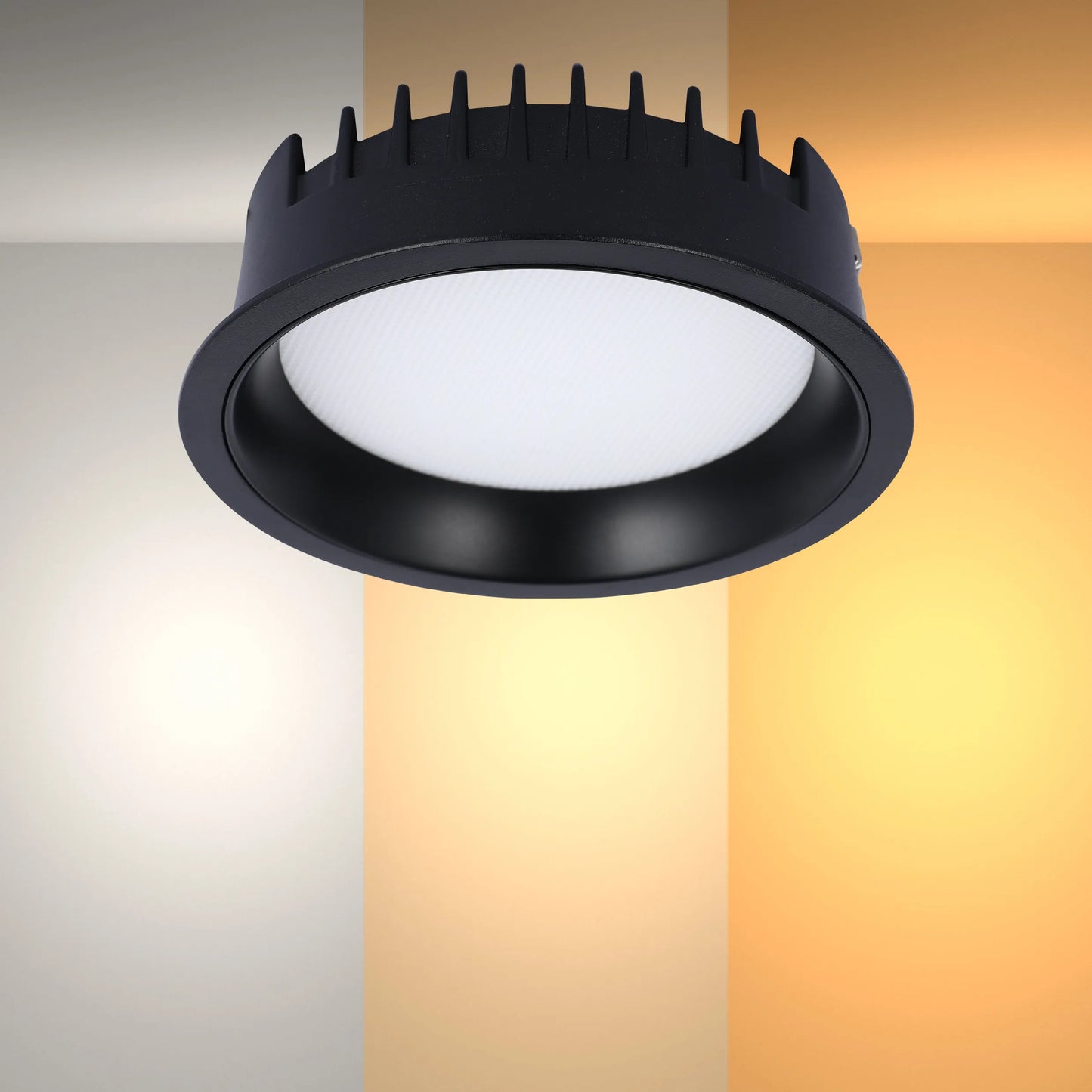 A contemporary black downlight with a diffused light output, displayed against a split background showing various light tones.