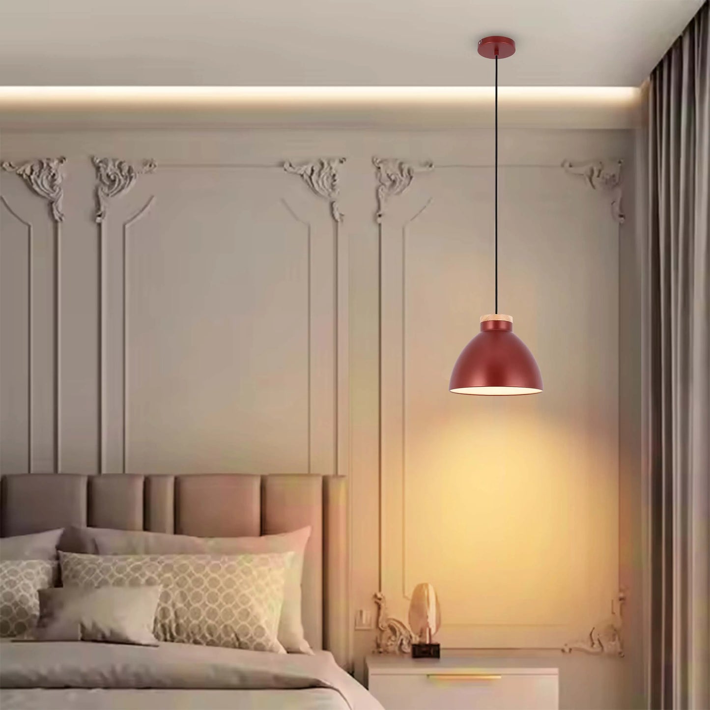A modern bedroom features an overhead pendant light, illuminating the space with a warm glow.