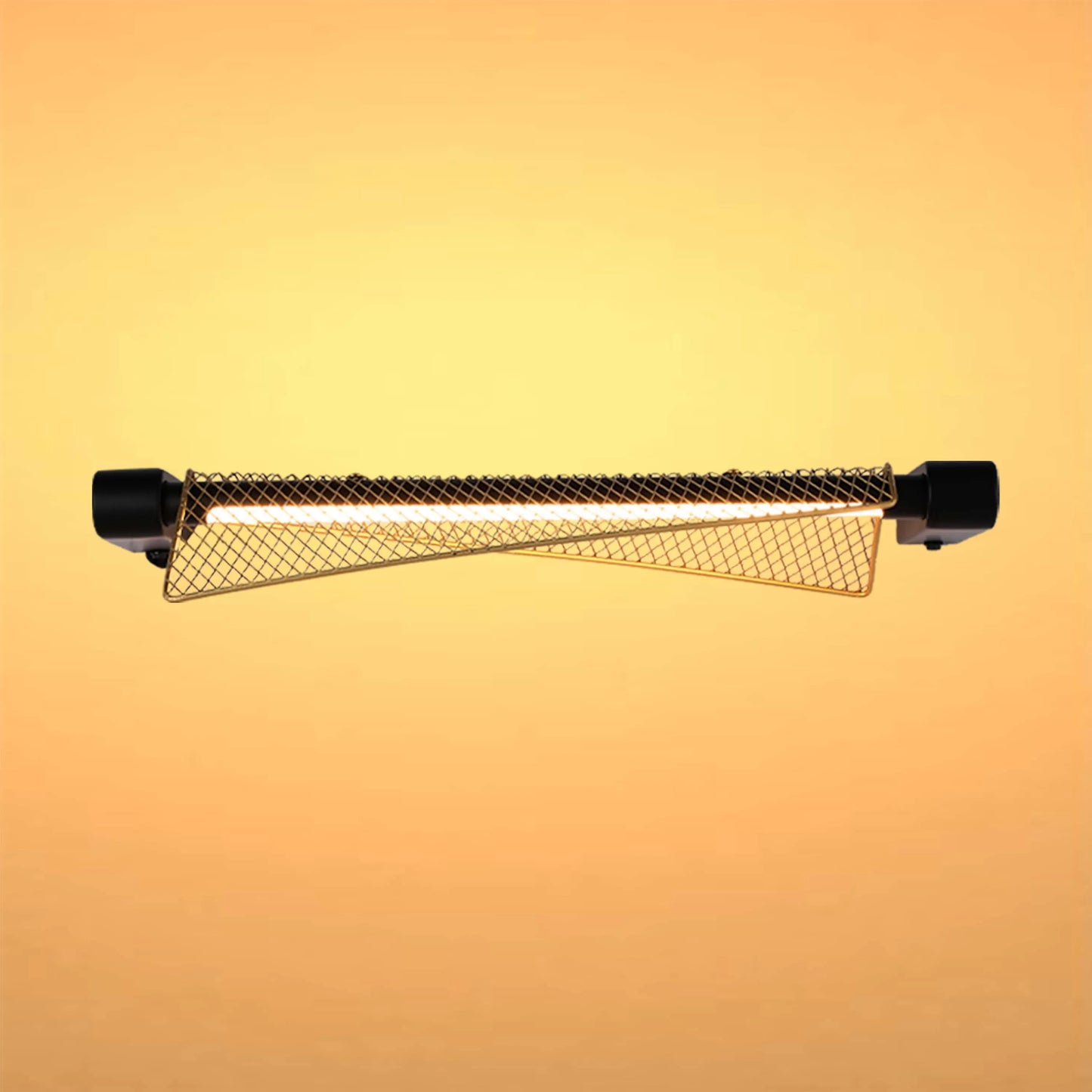 A minimalist wall light with a caged gold shade gives off a bright, warm glow against a muted golden background.