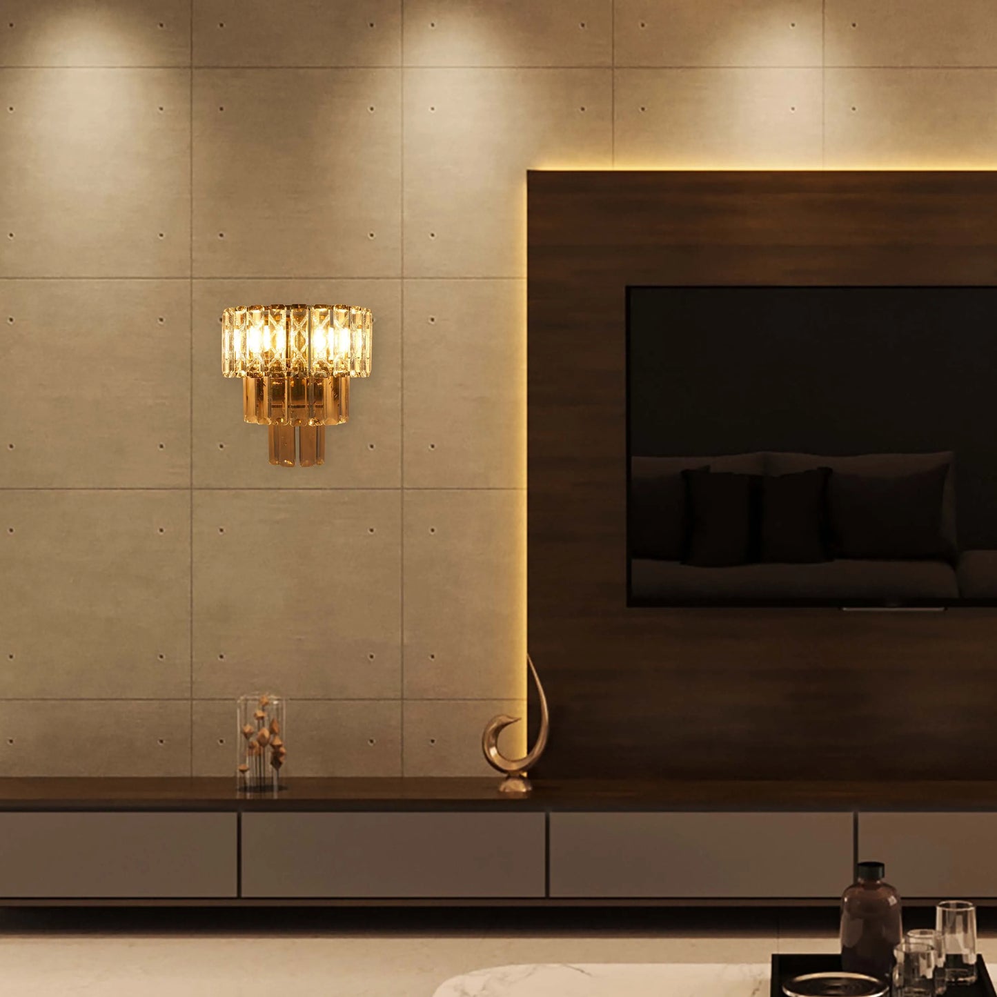 A decadent, two-tiered crystal wall light, emitting a warm, golden glow. Adds a touch of glamour to any room.