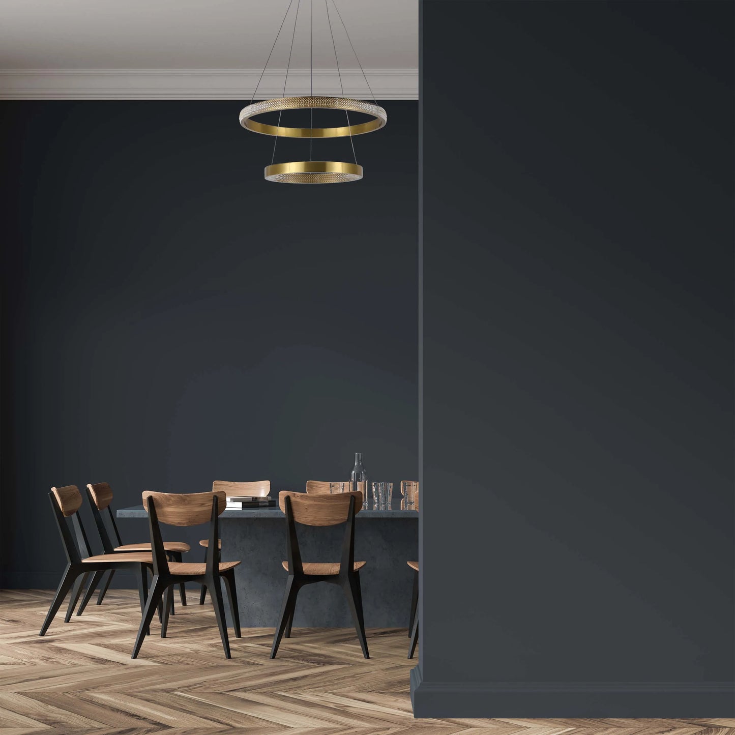 Contemporary gold ring pendant light, suspended above a dining table in a modern dining room.