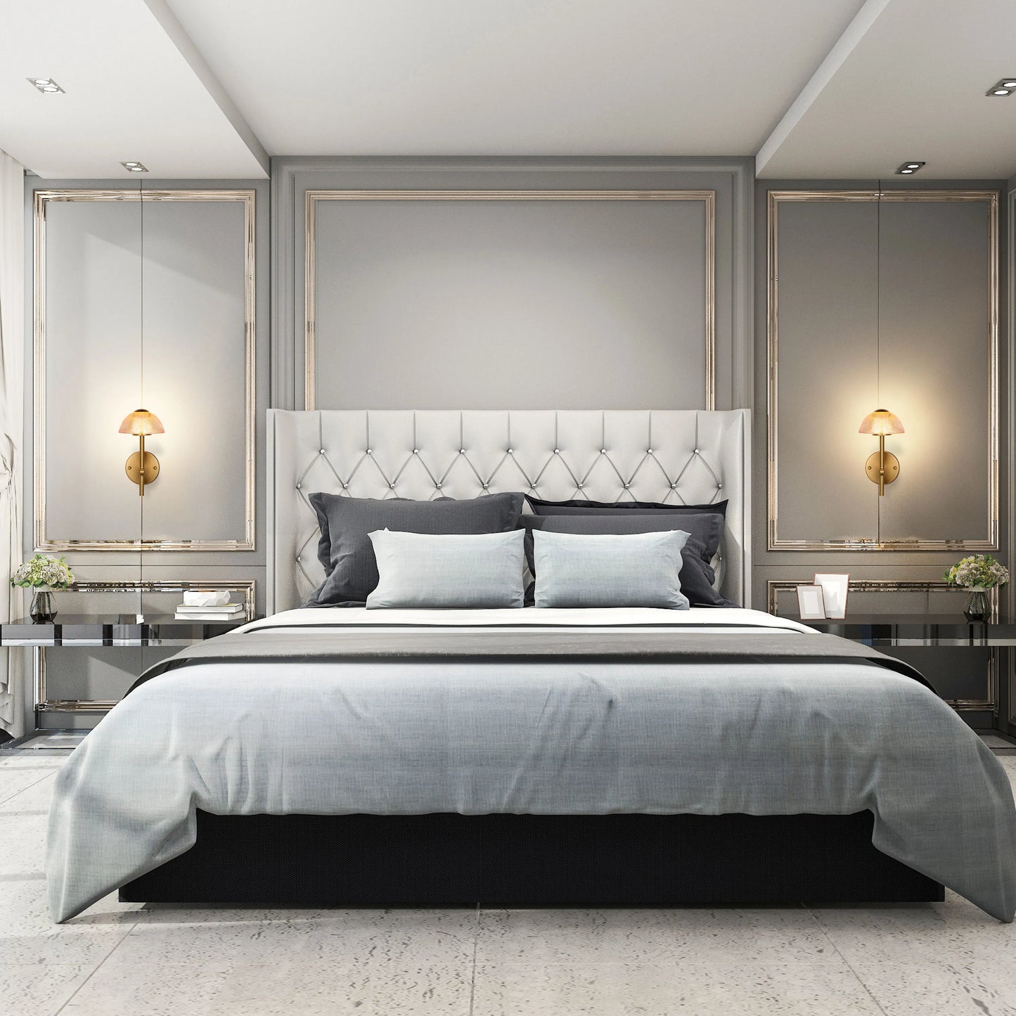 Bedroom with sconces flanking the bed. Overhead spotlights provide extra light in the room.
