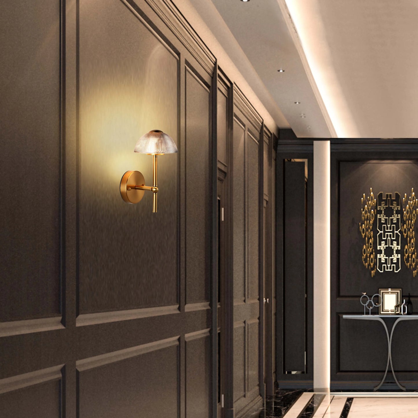 Stylish wall light with gold fitting and textured glass shade, illuminating a modern, dark-panelled hallway with recessed ceiling lights.