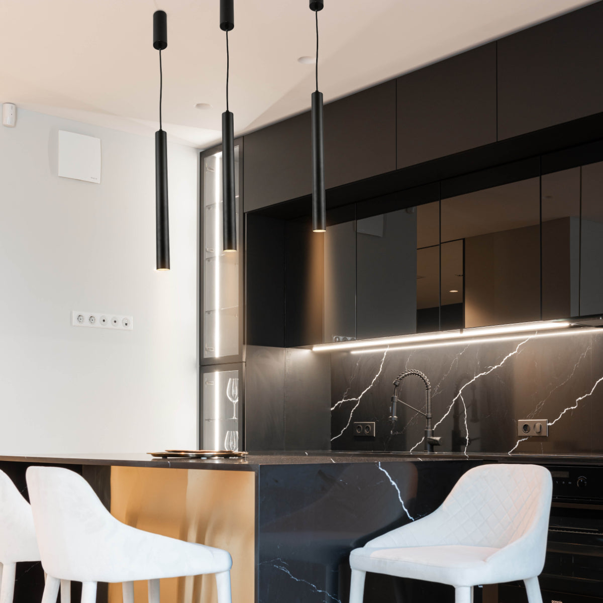 Integrated LED Modern Cylinder Pendant Ceiling Light Suspended Downlight Black - D40 mm on top of a kitchen island