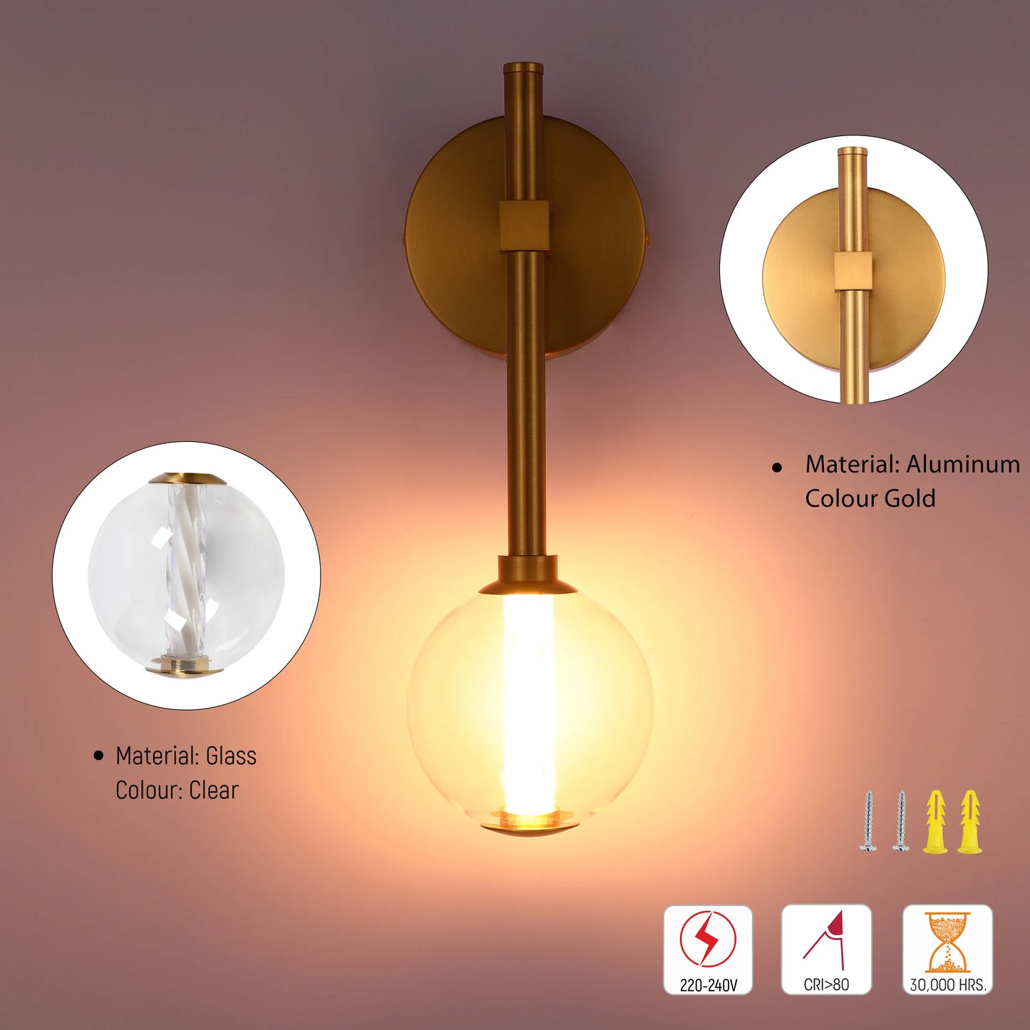 Gold wall light fixture with clear glass globe, featuring an illuminated bulb, and details of construction materials.