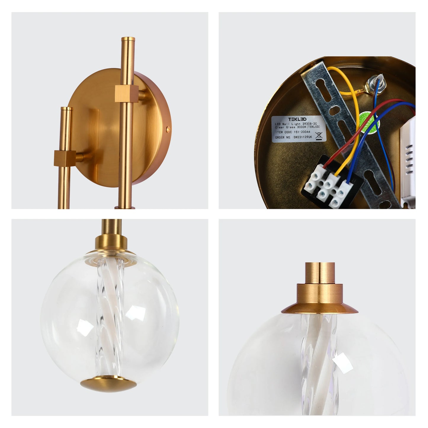 Gold wall light with a clear glass globe. Modern design that adds a touch of elegance to any room.