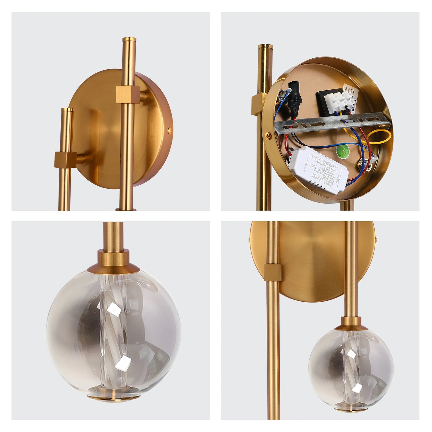 A modern brass wall light with a smoky glass globe. It features a minimalist design with visible wiring.