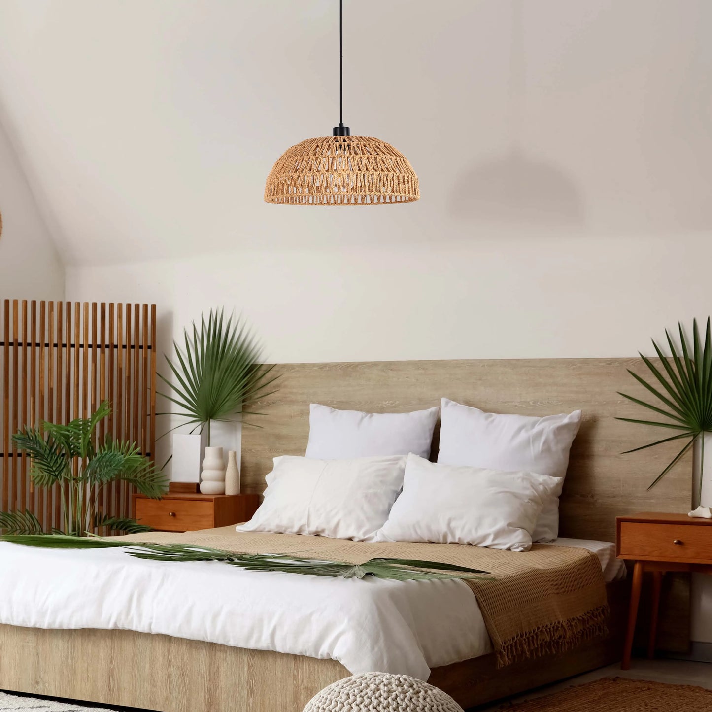 A woven, dome-shaped pendant light hangs from the ceiling. It has a natural, earthy tone that complements the bedroom's relaxed aesthetic.