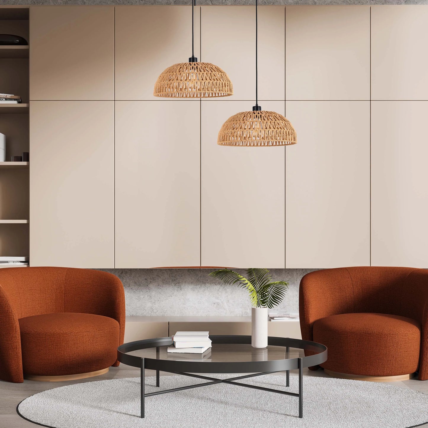 Two pendant lights with woven shades hang above a seating area. The warm tones create a cosy atmosphere.
