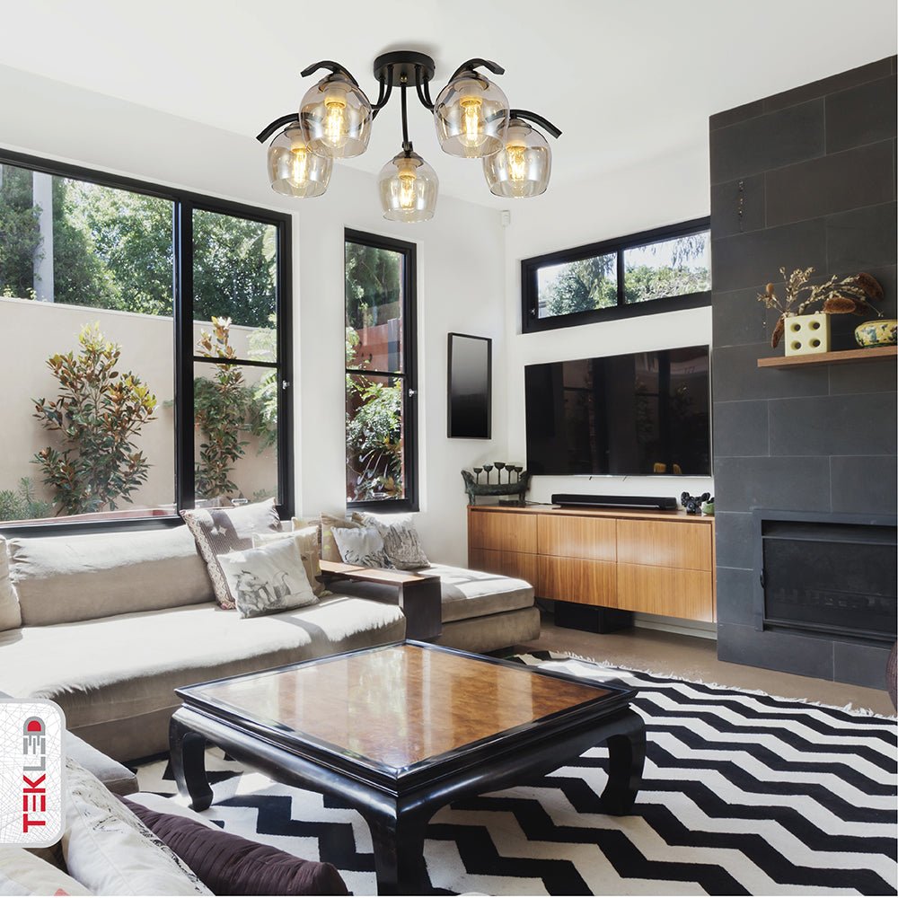 Amber glass black semi-flush ceiling light with 5xe27 fitting in indoor setting living room