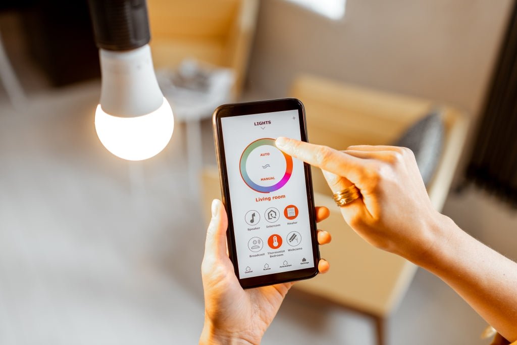A smartphone app controlling the color and brightness of a smart home LED bulb
