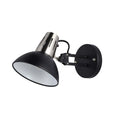 A modern wall light in black and silver, featuring an adjustable arm for focused illumination. Ideal for reading.