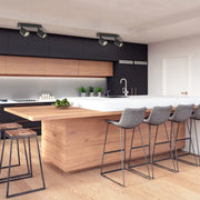 Stylish beam cylinder GU10 spotlight illuminating a modern living room with minimalist decor and warm ambiance. Perfect for accent lighting.172-03049