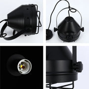 Industrial-style black pendant light with metal cage and adjustable arm, a stylish statement lighting piece.