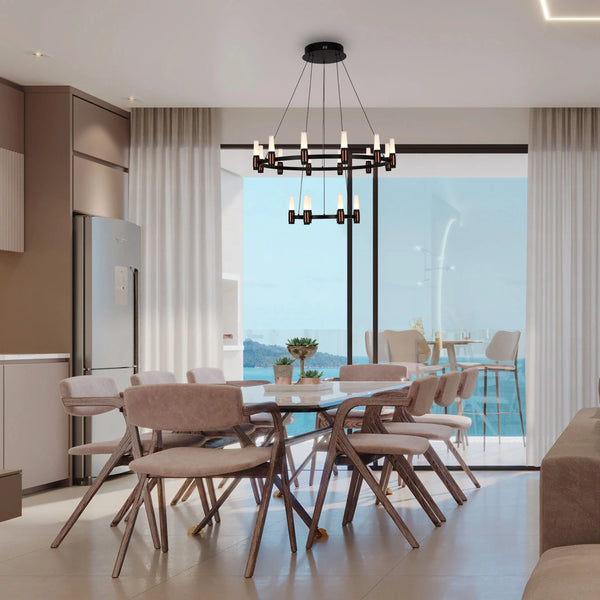 A modern chandelier hangs above a dining table, casting a soft, ambient light. Recessed spot lights can also be seen.