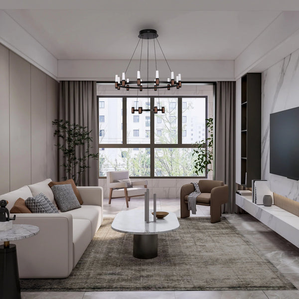 A modern living room with a striking black chandelier, complemented by natural light and subtle decorative lamps on the console table.