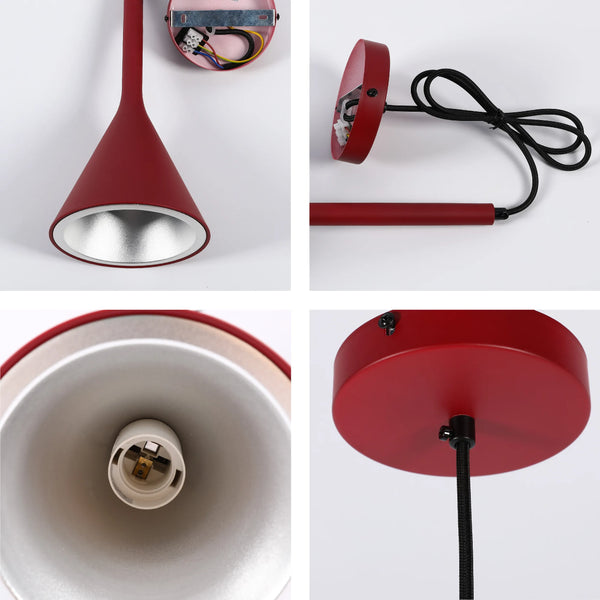 A modern, red, cone-shaped pendant light with a black fabric cable. Interior is silver.