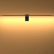 Modern wall light in black, emitting a soft warm glow. Stylish and energy-efficient lighting solution for any room.