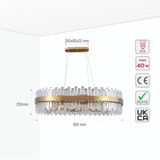 A stylish gold & crystal chandelier. Measurements are displayed, detailing size and specifications.