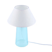A modern table lamp with a pale blue base and white textured shade, radiating a soft, inviting glow.
