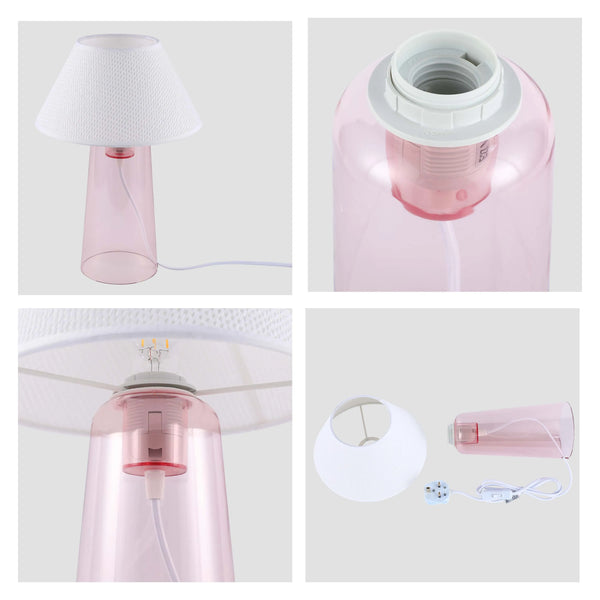 A trendy pink lamp with a white shade, adding a touch of modern elegance to any room.
