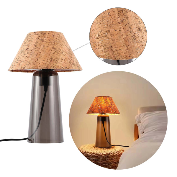 A modern table lamp with a cork shade and grey glass base. Perfect for adding a warm glow to any room.