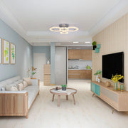 A modern chrome-finish LED ceiling light featuring interconnected rings, providing ample illumination for contemporary living spaces.