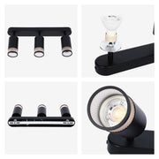 A modern, matte black spotlight bar with three adjustable lights, ideal for highlighting features in any room.
