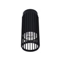 Modern black cylinder downlight with visible bulb. Contemporary design for stylish interior lighting solutions.