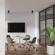 Modern room with flush ceiling spots. Provides ambient light and is energy efficient, ideal for offices, studios and minimalist designs.