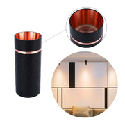 Stylish black and copper cylinder lights. Includes a close-up of the inner copper shade and a display in a modern living room.