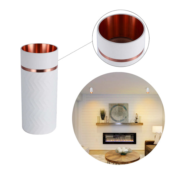 Modern cylinder wall lights with copper trim, blending seamlessly with contemporary interior design in a stylish living space.