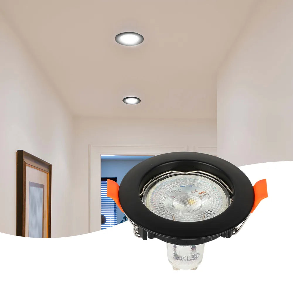 GU10 downlight fixture illuminating a modern kitchen with sleek cabinetry and minimalist decor, enhancing the space with warm, focused lighting.143-03990