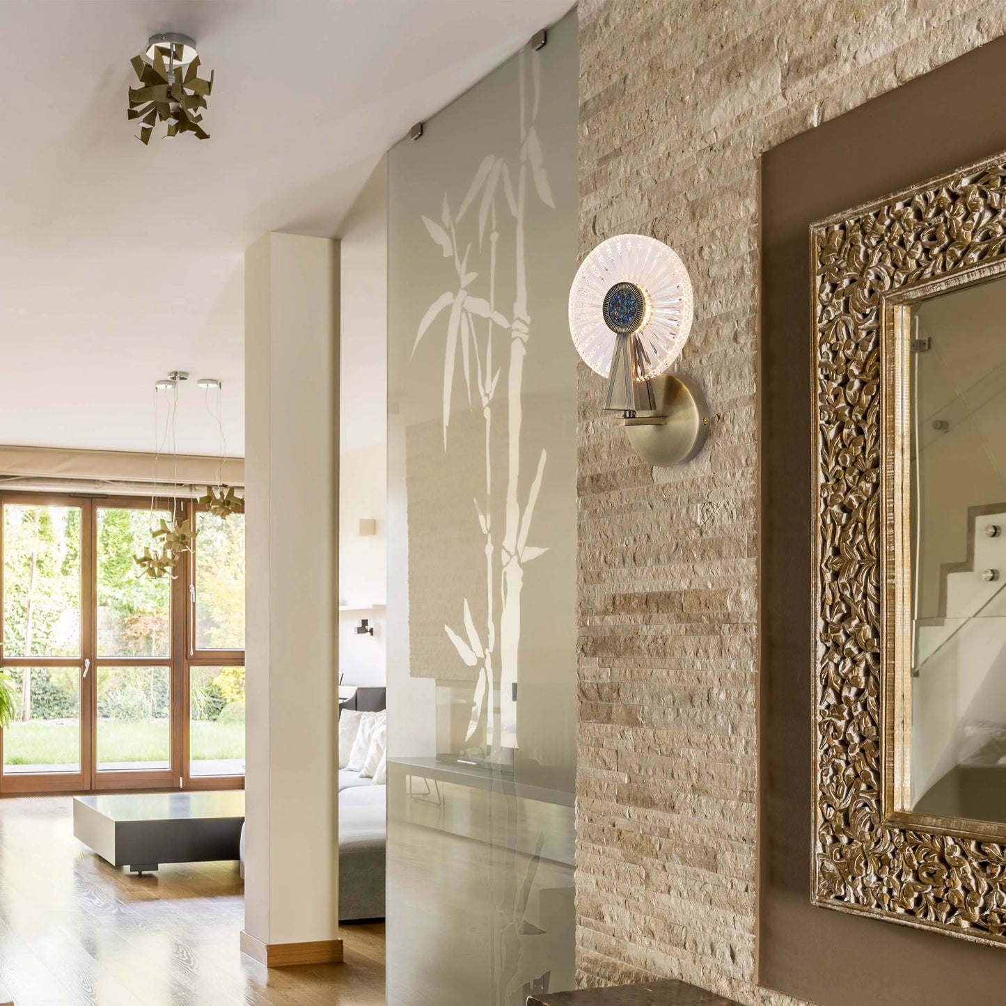 A hallway featuring statement ceiling and wall lights, creating a warm, inviting ambience in this stylish home.