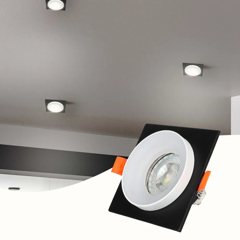 Sleek GU10 downlight fixture illuminates a modern kitchen, enhancing its contemporary decor with warm, adjustable lighting for a stylish ambience.143-03432