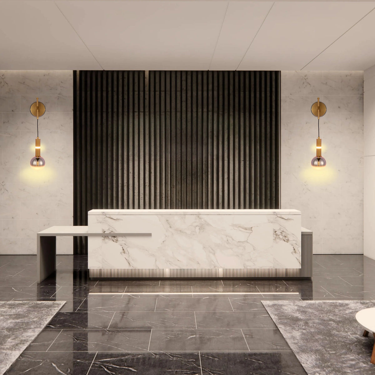 Statement lighting fixtures with gold accents flank a modern reception desk, adding a warm glow to the marble and dark wood backdrop.