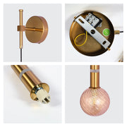 Contemporary wall and pendant light with a gold finish and pink glass shade, offering a sleek and modern lighting solution.
