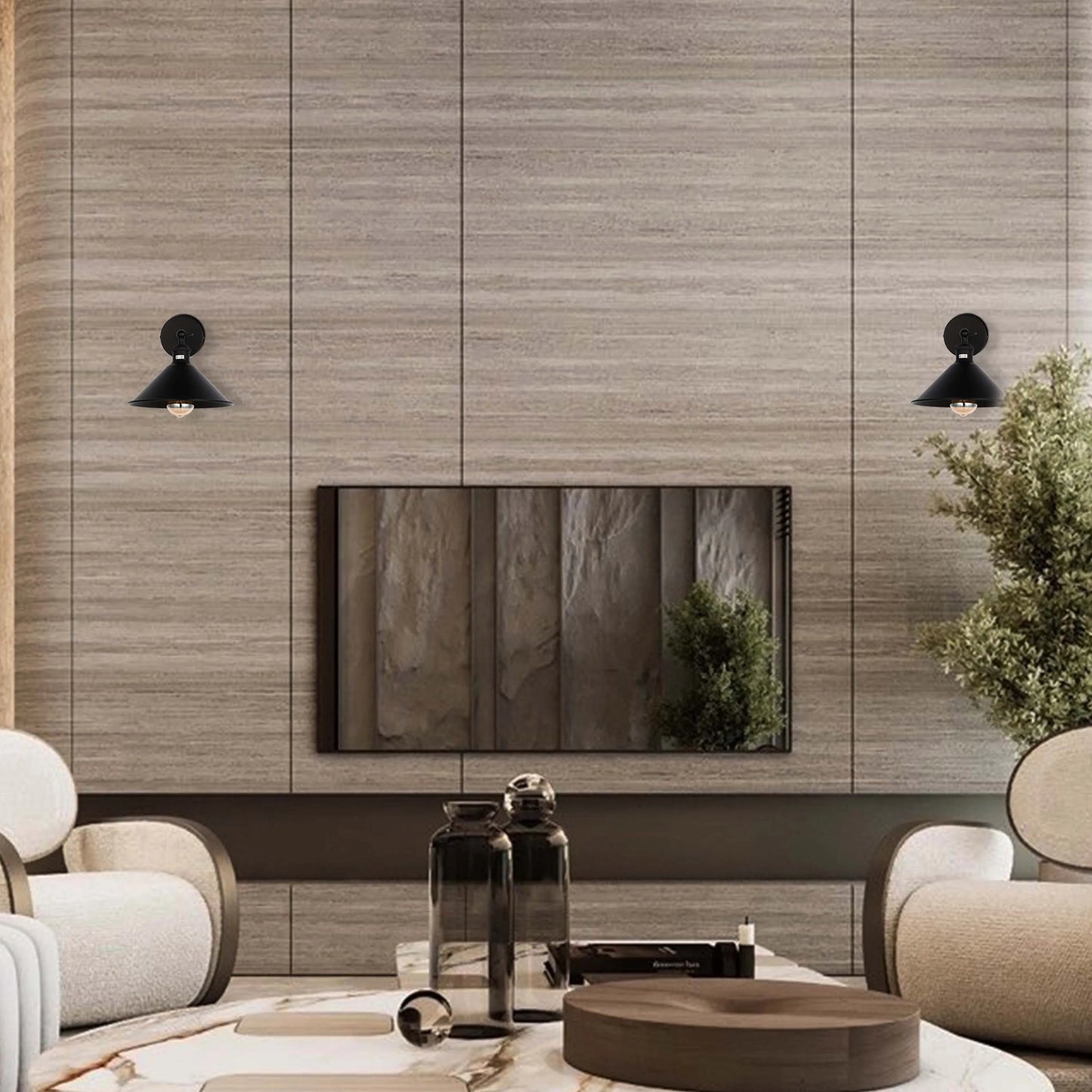 Two black, vintage-style wall lights illuminate a contemporary living room, adding a touch of industrial chic to the interior design.