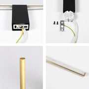A modern, matte black and gold LED light fitting, showcasing its sleek design and energy-efficient power supply.
