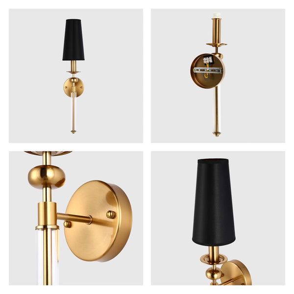 Contemporary gold wall light with a black shade and a clear glass accent. Stylish lighting for modern homes.