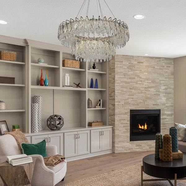 Crystal chandelier suspended above the room. Recessed lighting offers additional illumination for a bright and welcoming atmosphere.