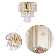 A gold and crystal, multi-tiered wall light in an opulent setting, with a chandelier variant also shown.