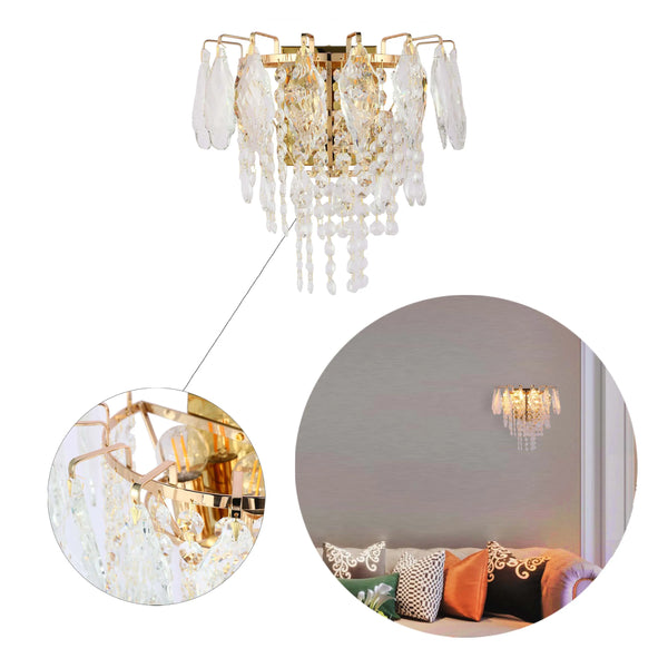 A gold and crystal wall sconce. Opulent lighting for an entryway, bedroom, or dining room.