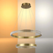 Gold ring chandelier. Two horizontal gold rings suspended with clear cables. Modern and elegant lighting design.