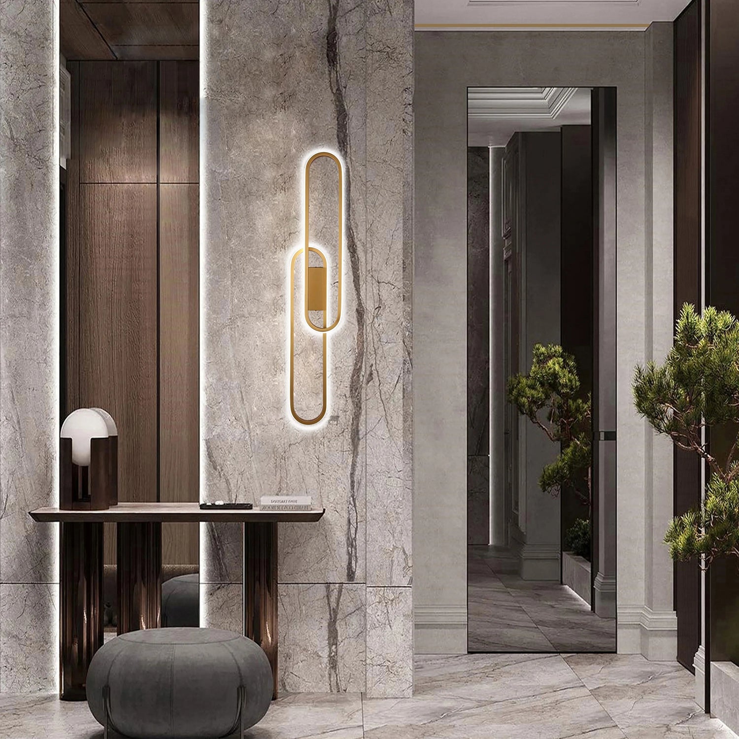 Modern hallway lighting featuring a sleek, LED feature wall light, and soft ambient lighting from a table lamp.