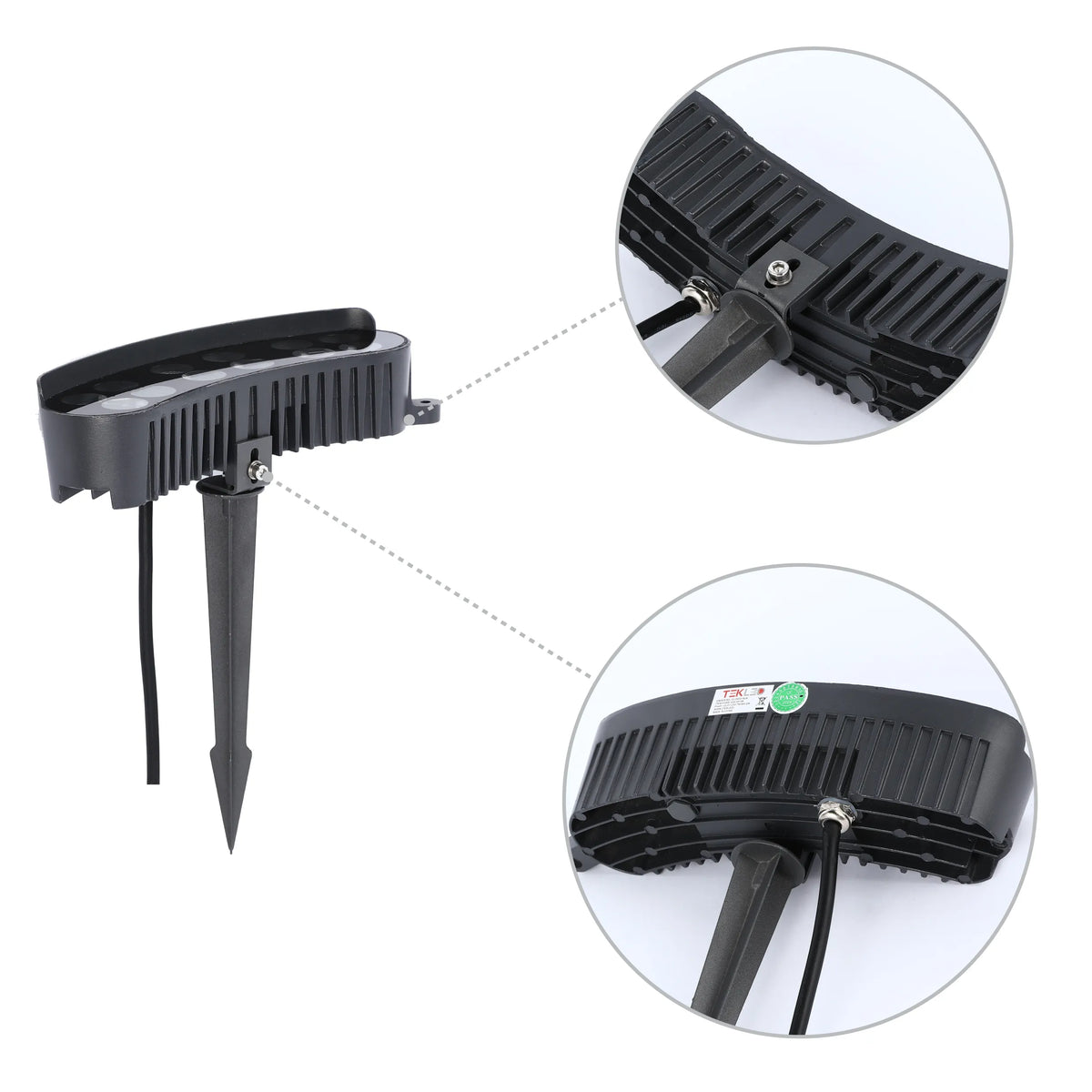 A black outdoor spotlight, featuring a ground spike and heat sink, for illuminating gardens and landscapes.